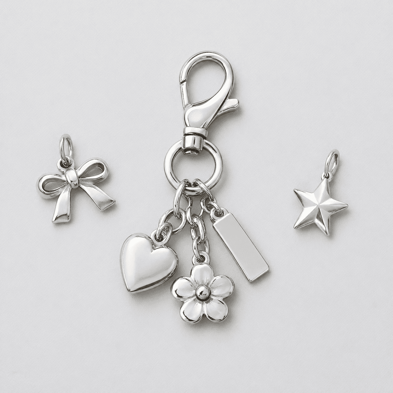 Guide to Stainless Steel Bag Charm Keychain Manufacturer Finishes - Blog Header Image