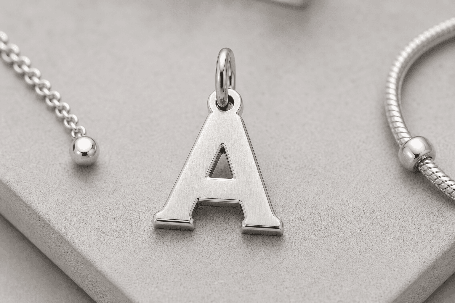 Material Guide: Alphabet 316L Stainless Initial Charms